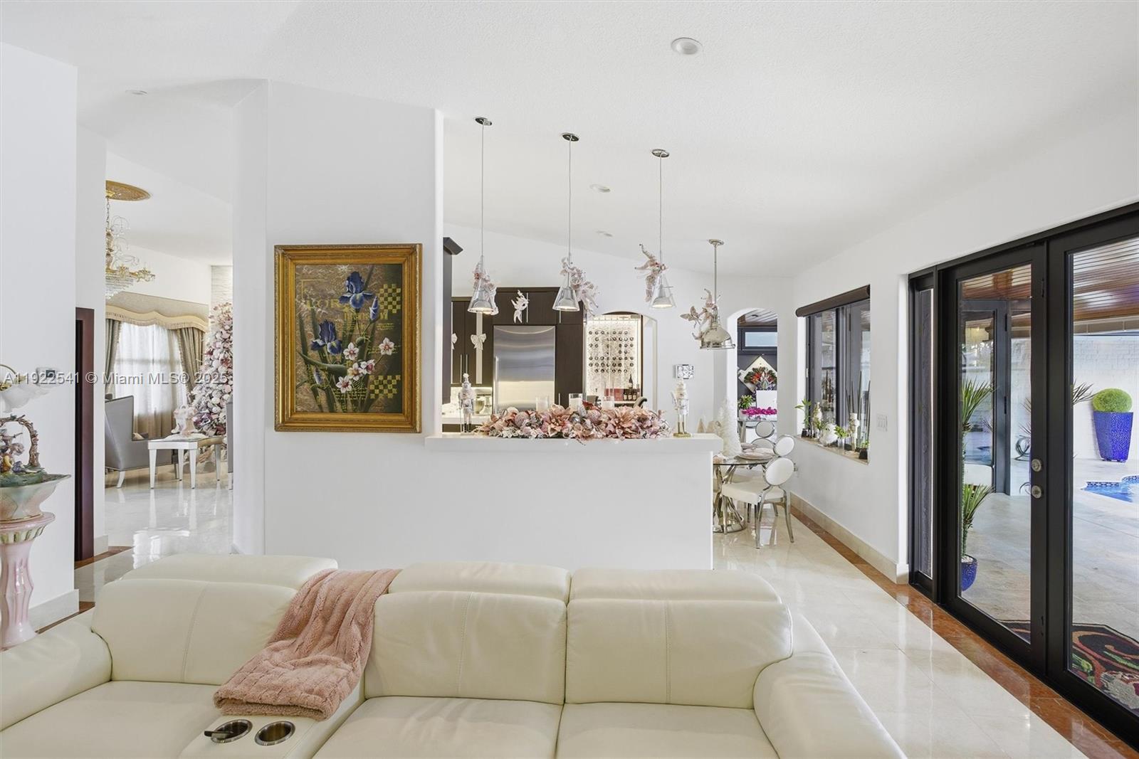 14252 Southwest 30th Street Miami, FL 33175 - Photo 13 of 60 a living room with furniture and large windows