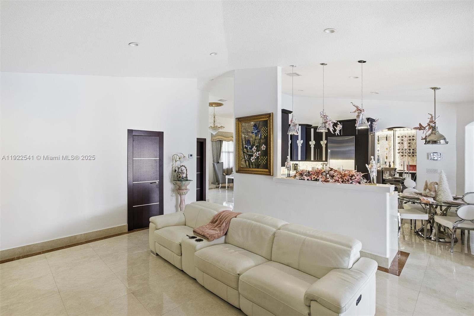 14252 Southwest 30th Street Miami, FL 33175 - Photo 14 of 60 a living room with furniture and a large window