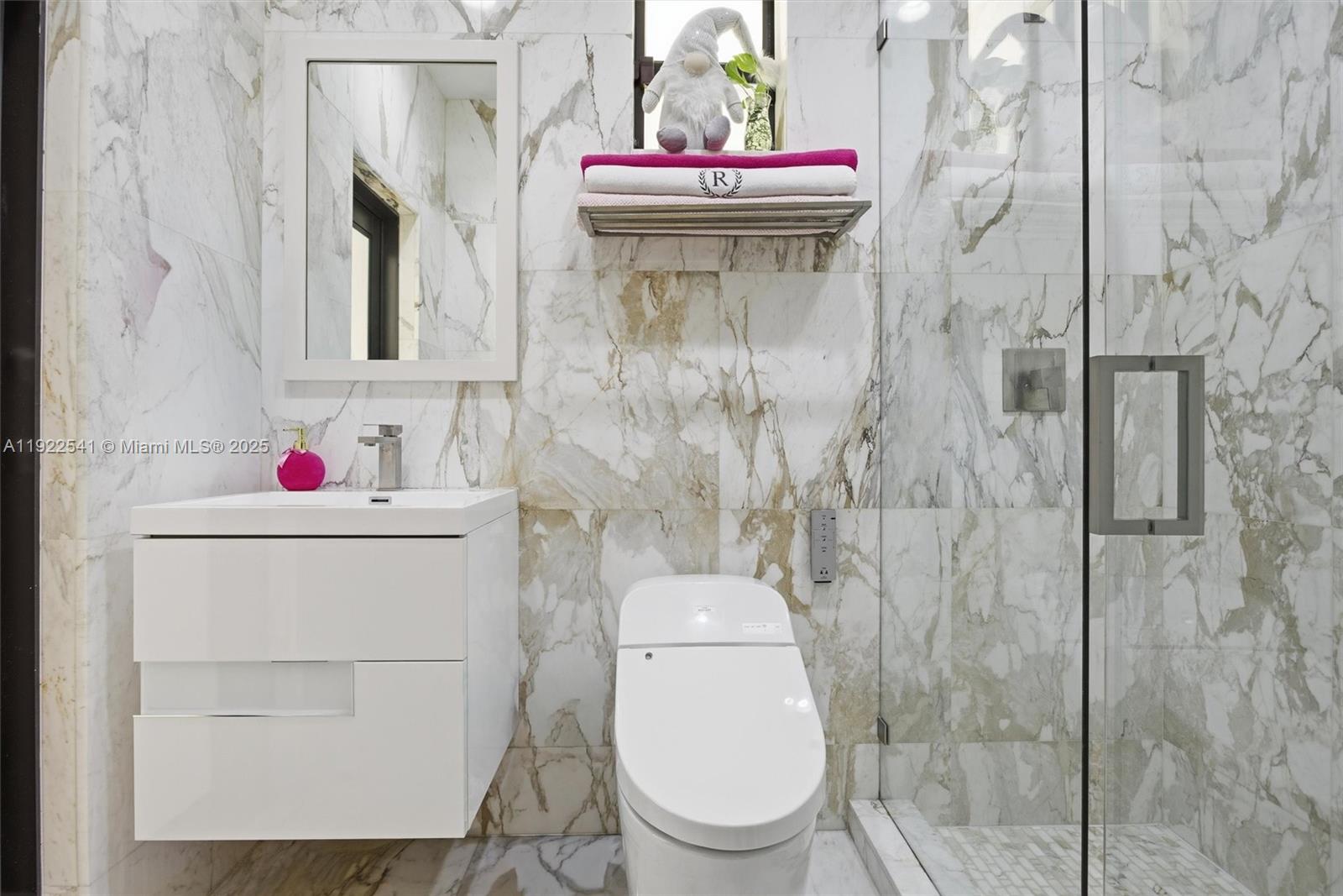 14252 Southwest 30th Street Miami, FL 33175 - Photo 19 of 60 a bathroom with a toilet sink and shower curtain