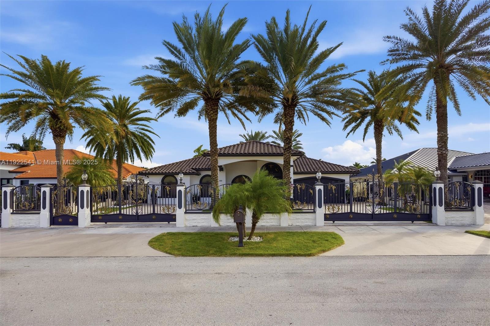 14252 Southwest 30th Street Miami, FL 33175 - Photo 2 of 60 a front view of multi story residential apartment building with yard and green space