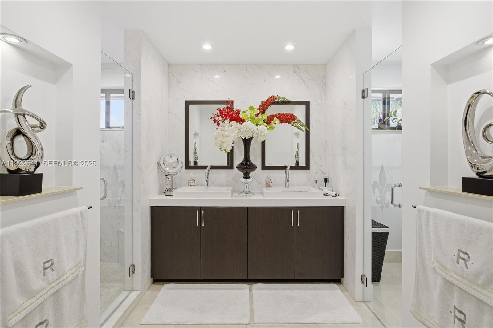 14252 Southwest 30th Street Miami, FL 33175 - Photo 24 of 60 a bathroom with a sink vanity and mirror