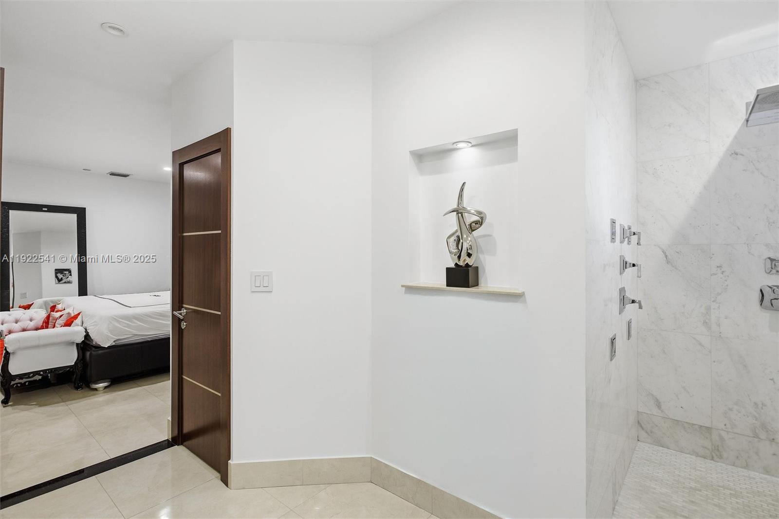 14252 Southwest 30th Street Miami, FL 33175 - Photo 26 of 60 a bedroom with a bed and a bathroom