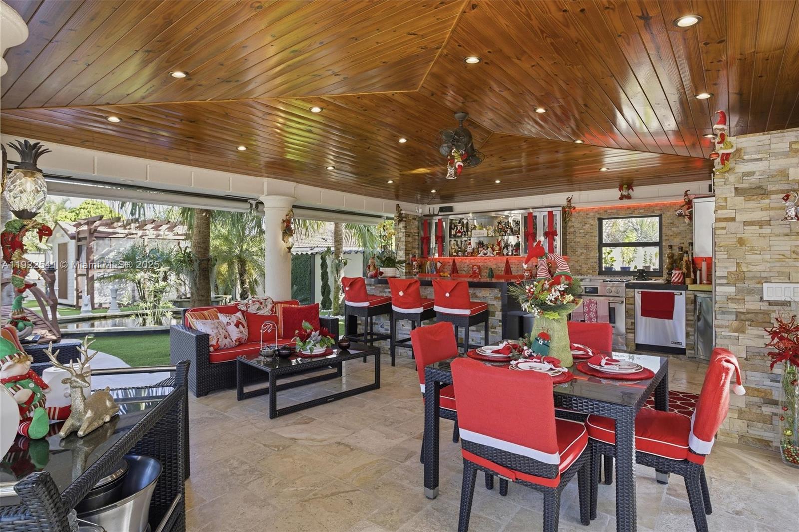 14252 Southwest 30th Street Miami, FL 33175 - Photo 39 of 60 a outdoor space with lots of furniture and outdoor seating