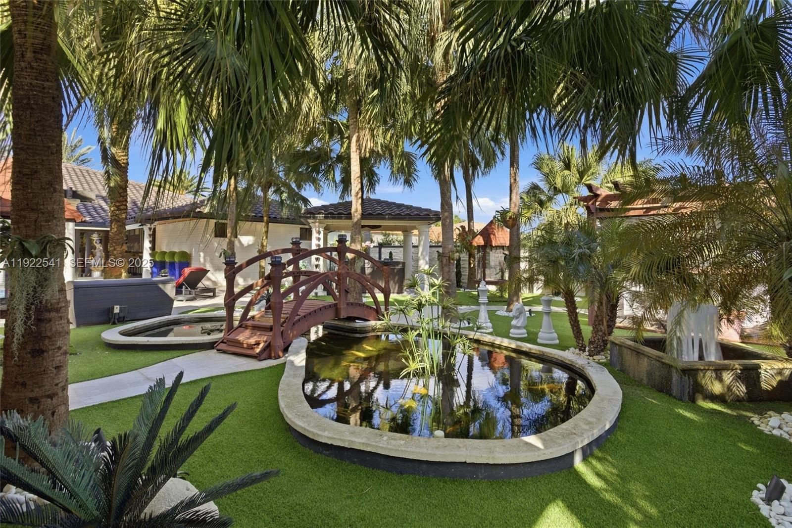 14252 Southwest 30th Street Miami, FL 33175 - Photo 42 of 60 a house with outdoor seating