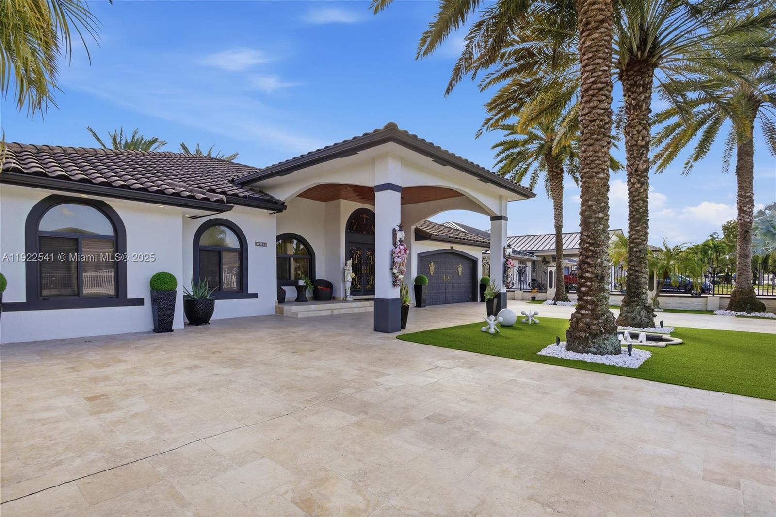 14252 Southwest 30th Street Miami, FL 33175 - Photo 51 of 60 a view of a house with a patio