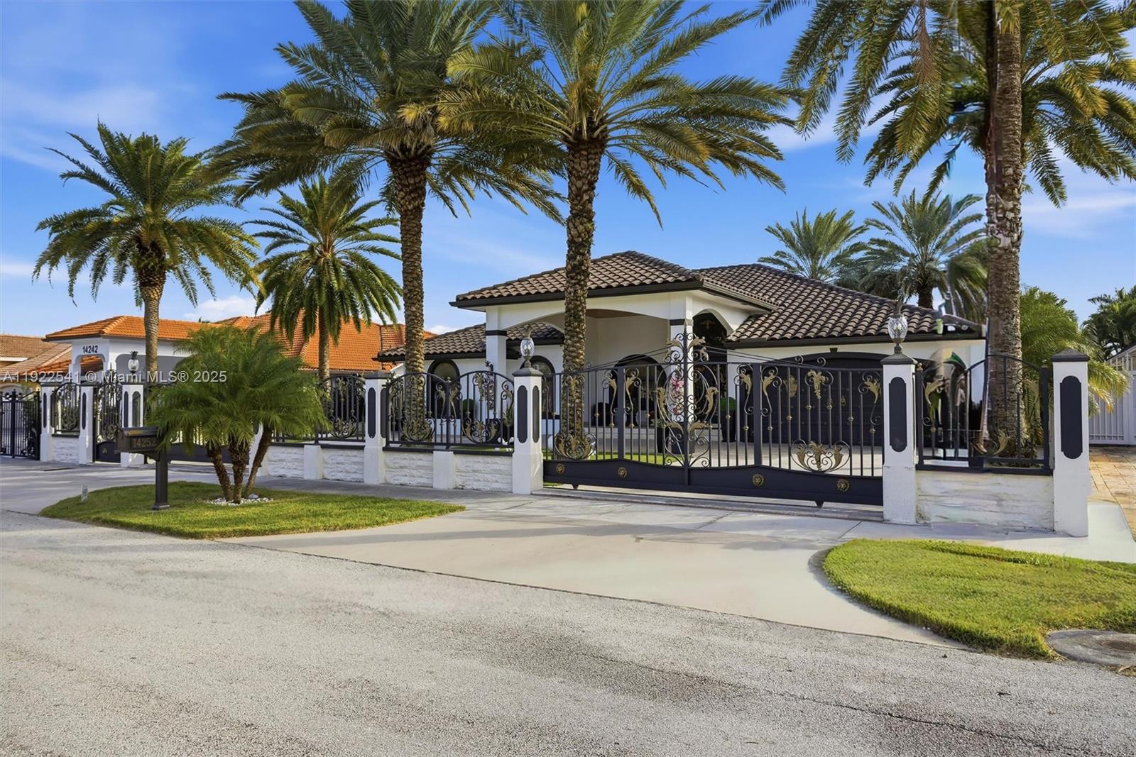 14252 Southwest 30th Street Miami, FL 33175 - Photo 52 of 60 a view of a swimming pool with a plants and palm trees