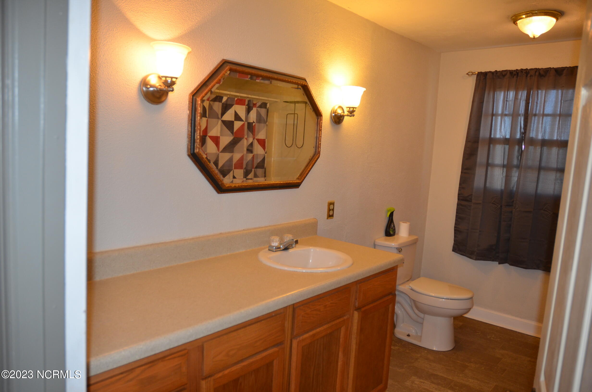 6759 Good News Church Road Stantonsburg, NC 27883 - Photo 14 of 54 Full bathroom #1 off kitchen