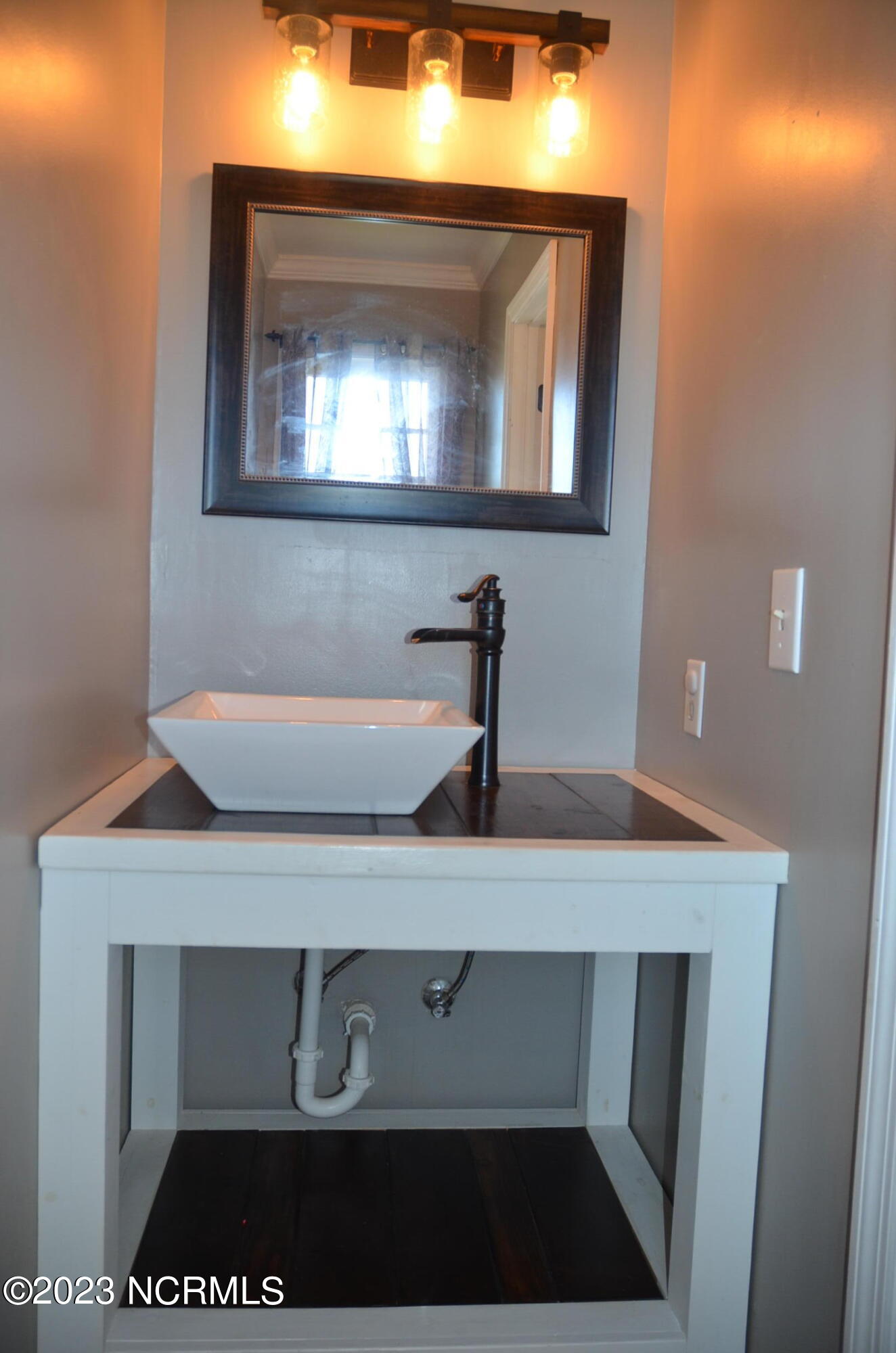 6759 Good News Church Road Stantonsburg, NC 27883 - Photo 23 of 54 Sink in half bath