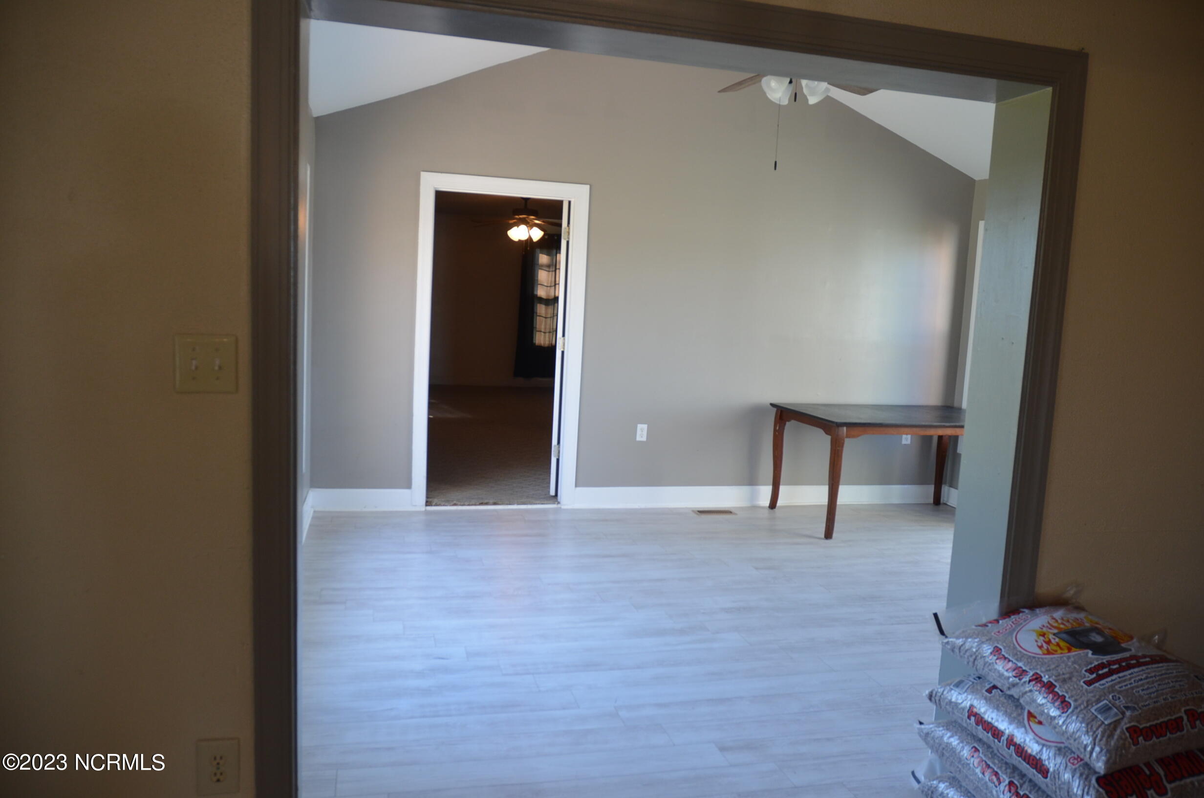 6759 Good News Church Road Stantonsburg, NC 27883 - Photo 26 of 54 From living room is a Flex room-formal dining room? work out room? play room?