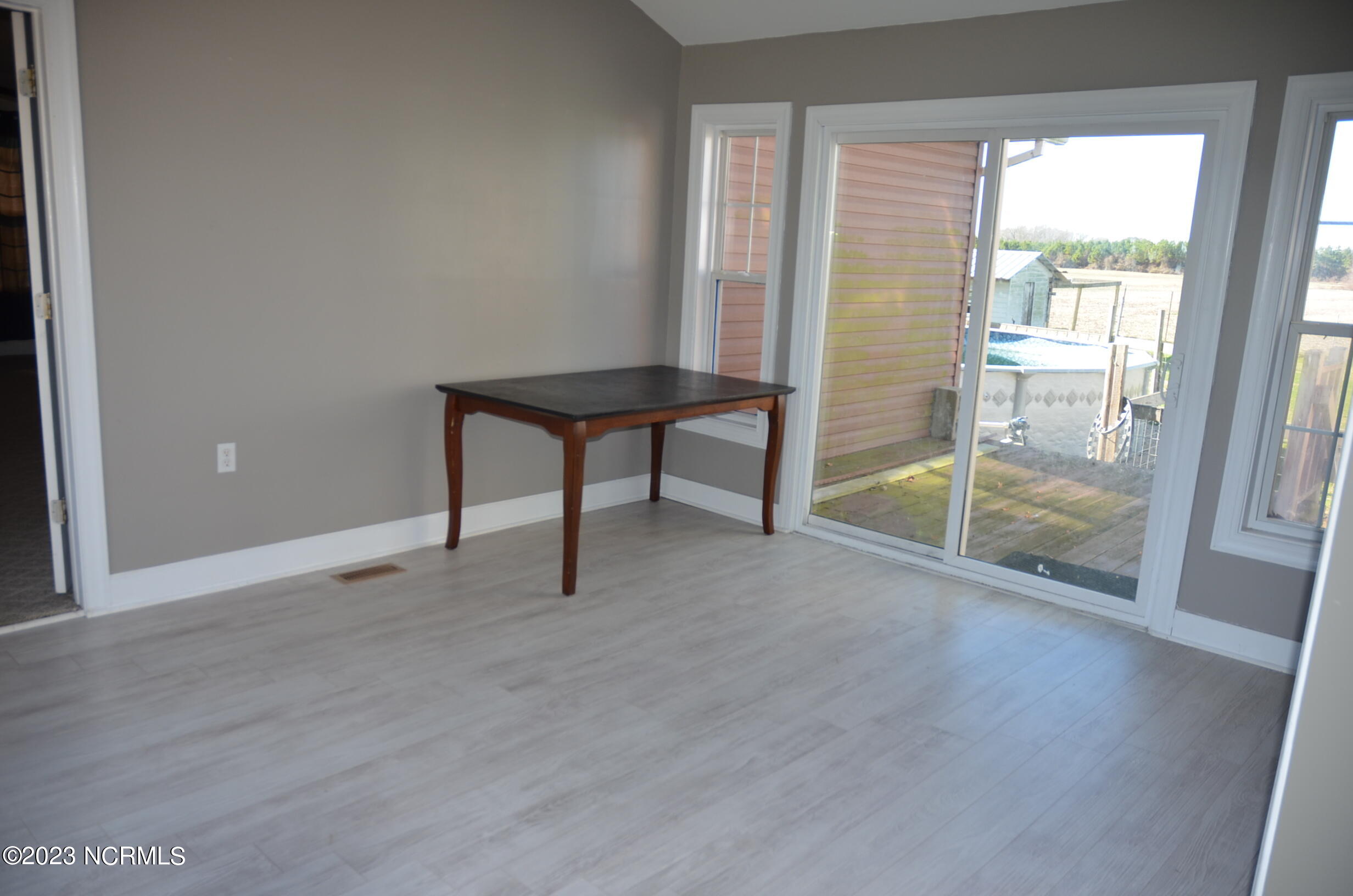 6759 Good News Church Road Stantonsburg, NC 27883 - Photo 27 of 54 Flex room with sliders to back deck/yard
