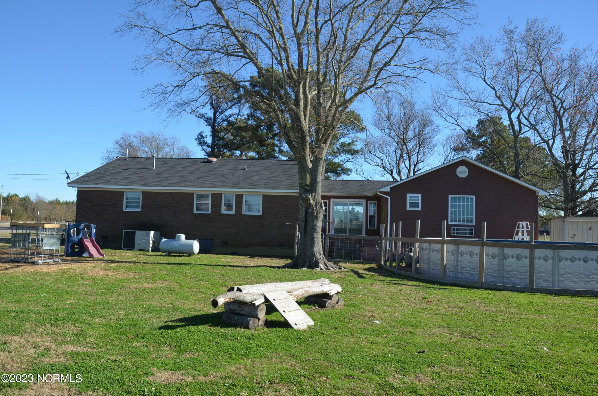 6759 Good News Church Road Stantonsburg, NC 27883 - Photo 46 of 54 Back of home showing above ground pool