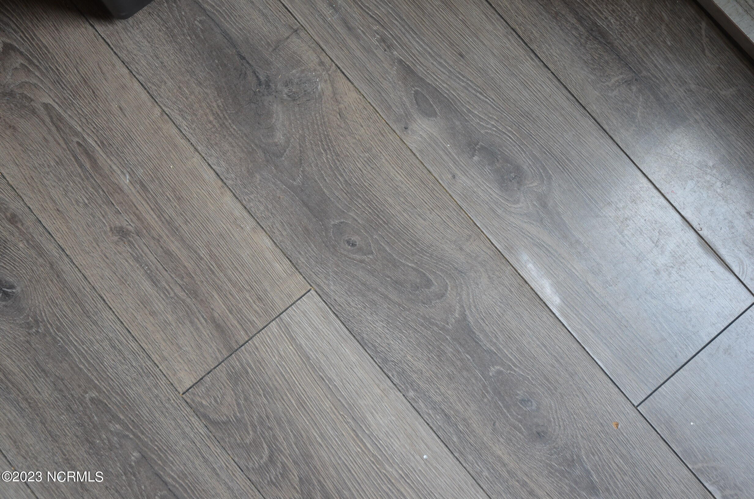 6759 Good News Church Road Stantonsburg, NC 27883 - Photo 9 of 54 Flooring in kitchen living areas