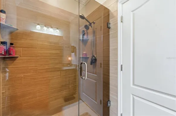 a bathroom with a sink toilet and mirror