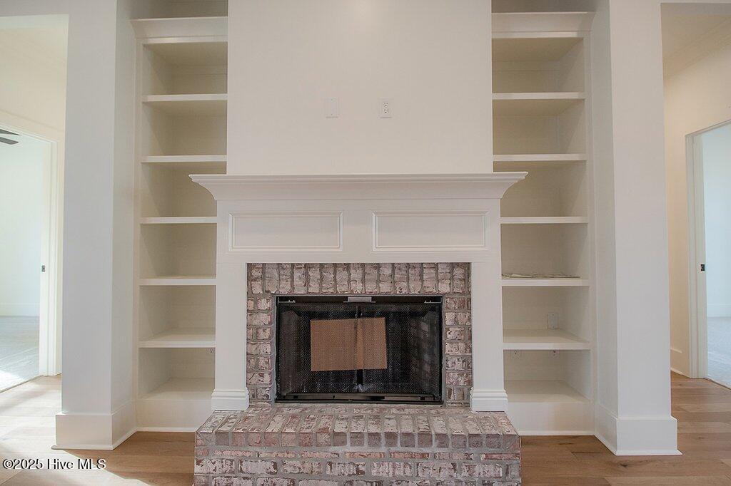 417 Connell Road Carthage, NC 28327 - Photo 4 of 19 Den Fire place and shelves 18
