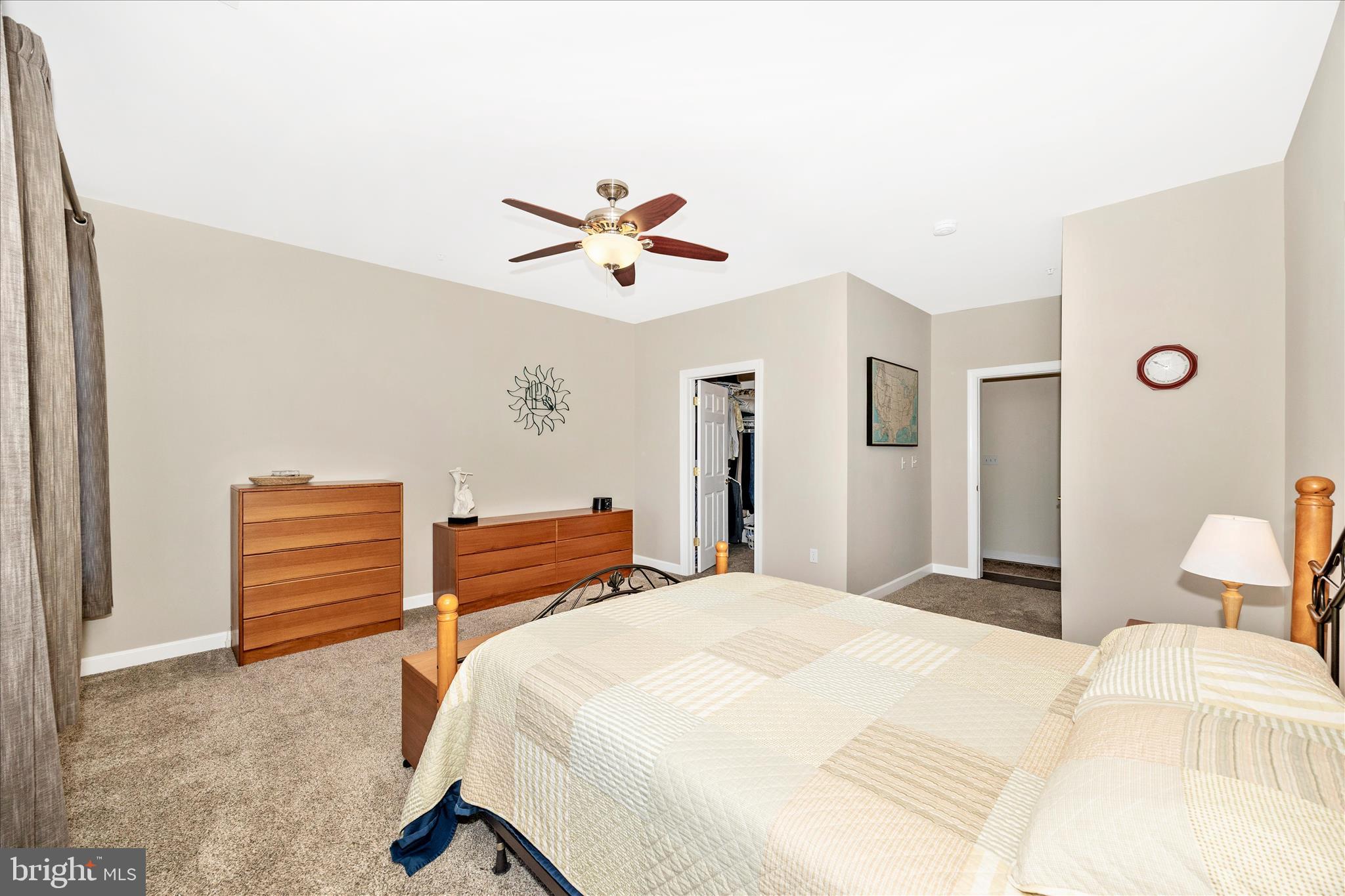 35 East All Saints Street, Unit 211 Frederick, MD 21701 - Photo 23 of 61 a bedroom with a bed and a closet