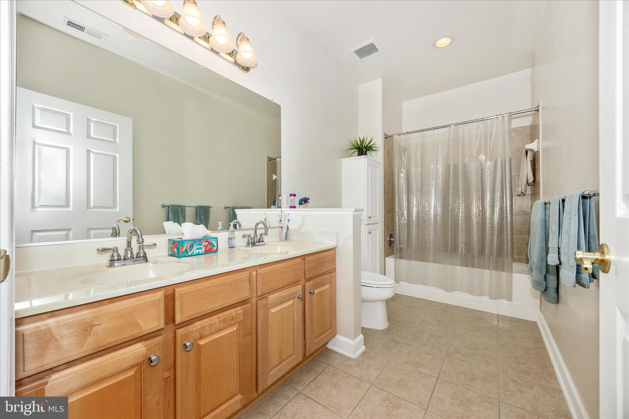 35 East All Saints Street, Unit 211 Frederick, MD 21701 - Photo 24 of 61 Primary bath with dual sink vanity.