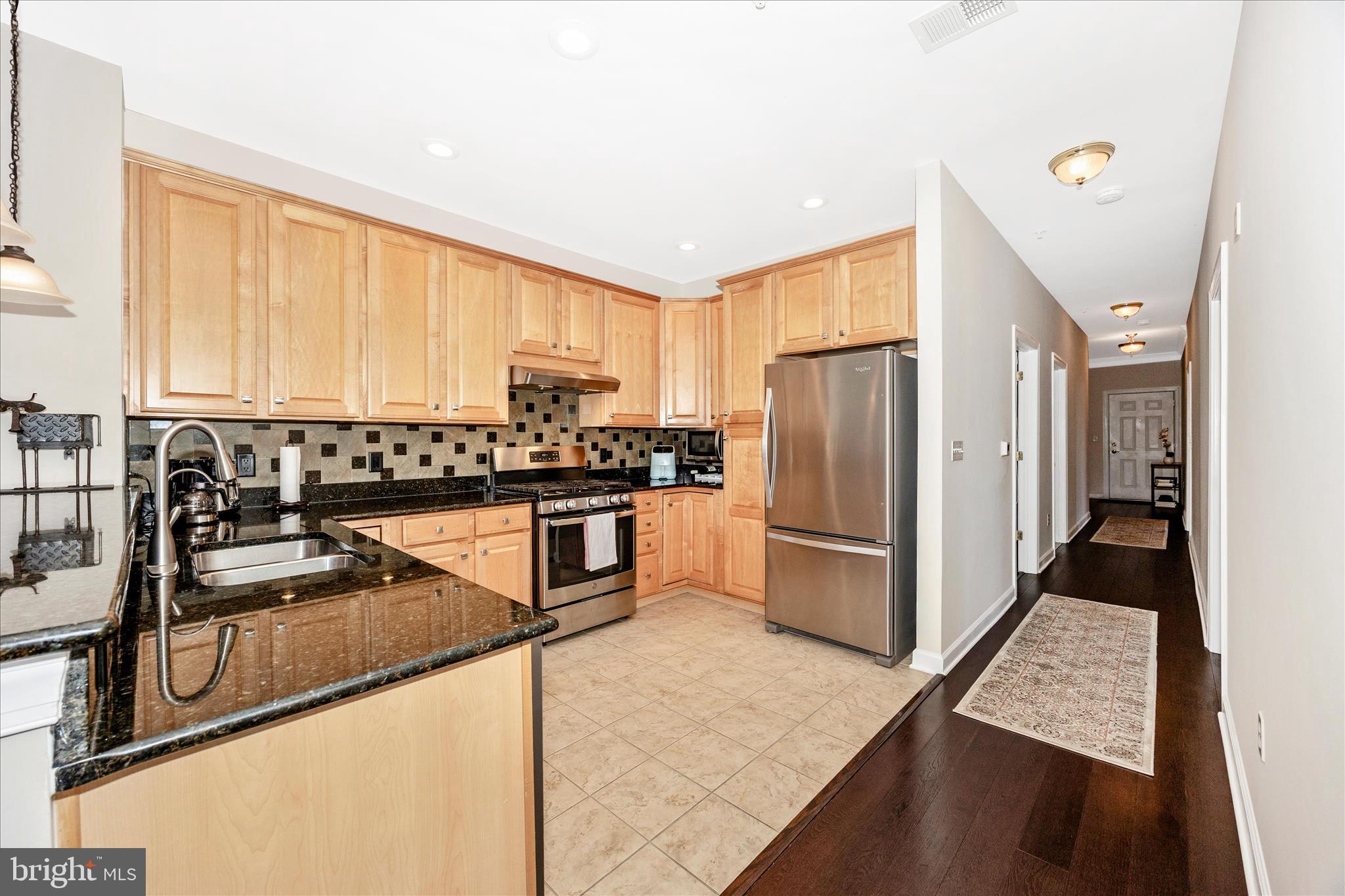 35 East All Saints Street, Unit 211 Frederick, MD 21701 - Photo 28 of 61 Highly functional kitchen layout.