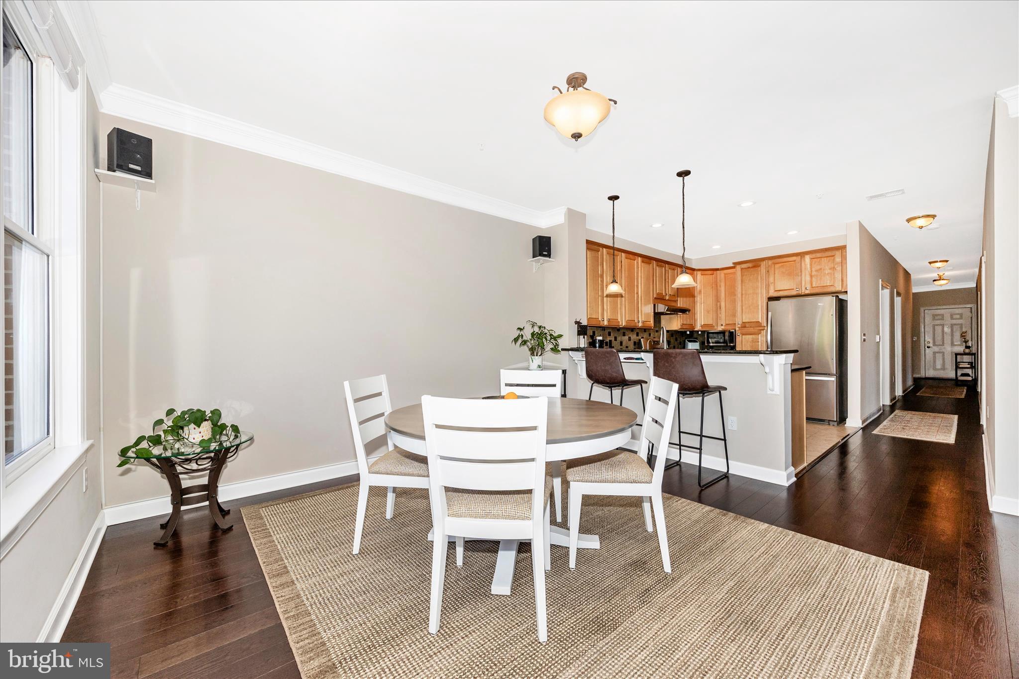 35 East All Saints Street, Unit 211 Frederick, MD 21701 - Photo 33 of 61 a view of a dining room with furniture