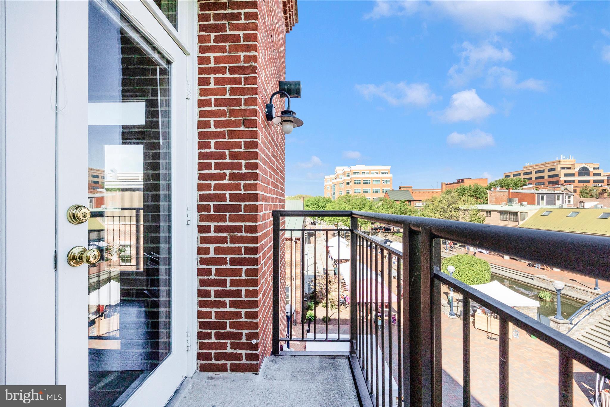 35 East All Saints Street, Unit 211 Frederick, MD 21701 - Photo 45 of 61 a view of a balcony with an outdoor space