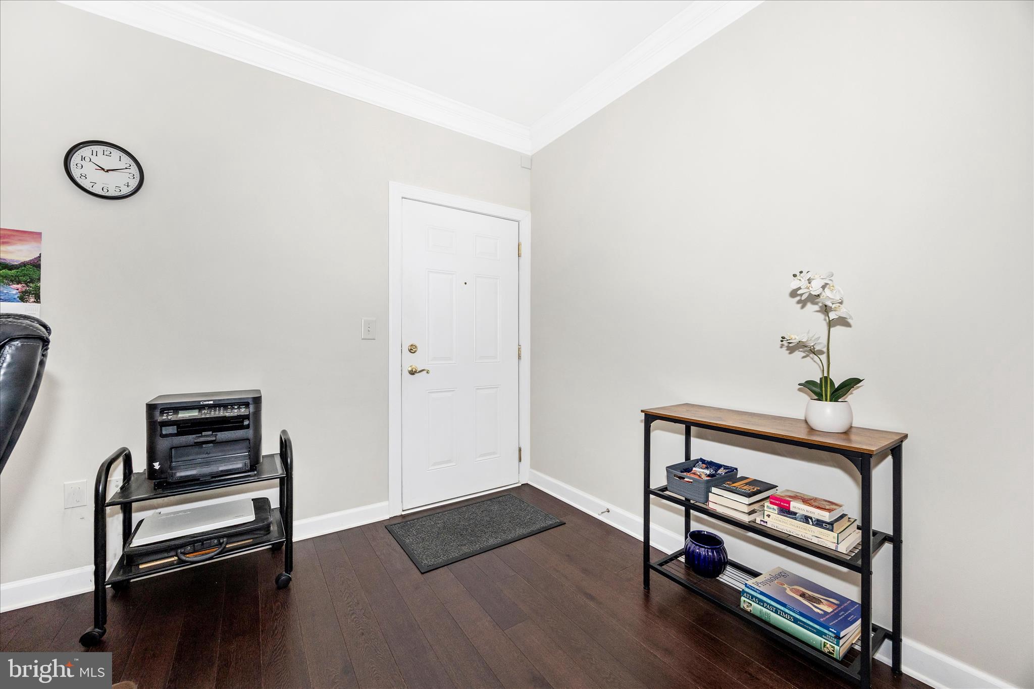 35 East All Saints Street, Unit 211 Frederick, MD 21701 - Photo 7 of 61 a view of room with workspace and wooden floor