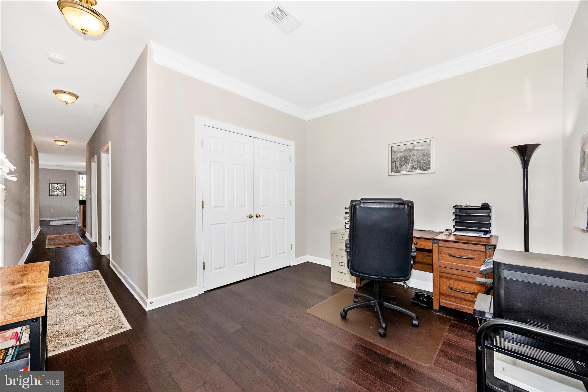35 East All Saints Street, Unit 211 Frederick, MD 21701 - Photo 9 of 61 a view of workspace with wooden floor stairs