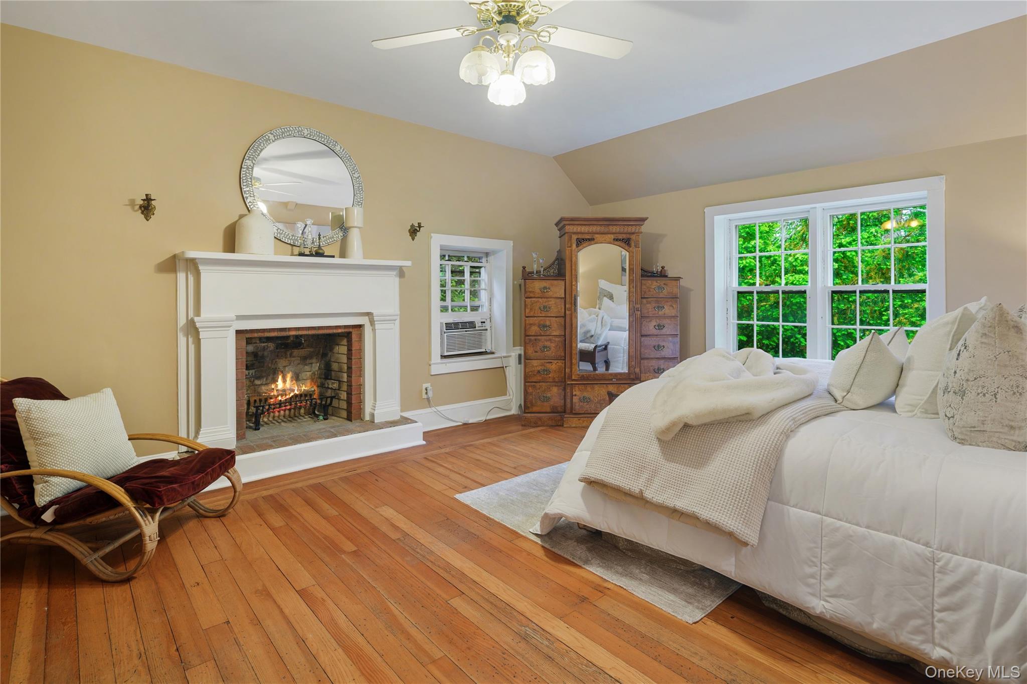 36 Granite Springs Road Granite Springs, NY 10527 - Photo 28 of 49 a spacious bedroom with a bed and a fireplace
