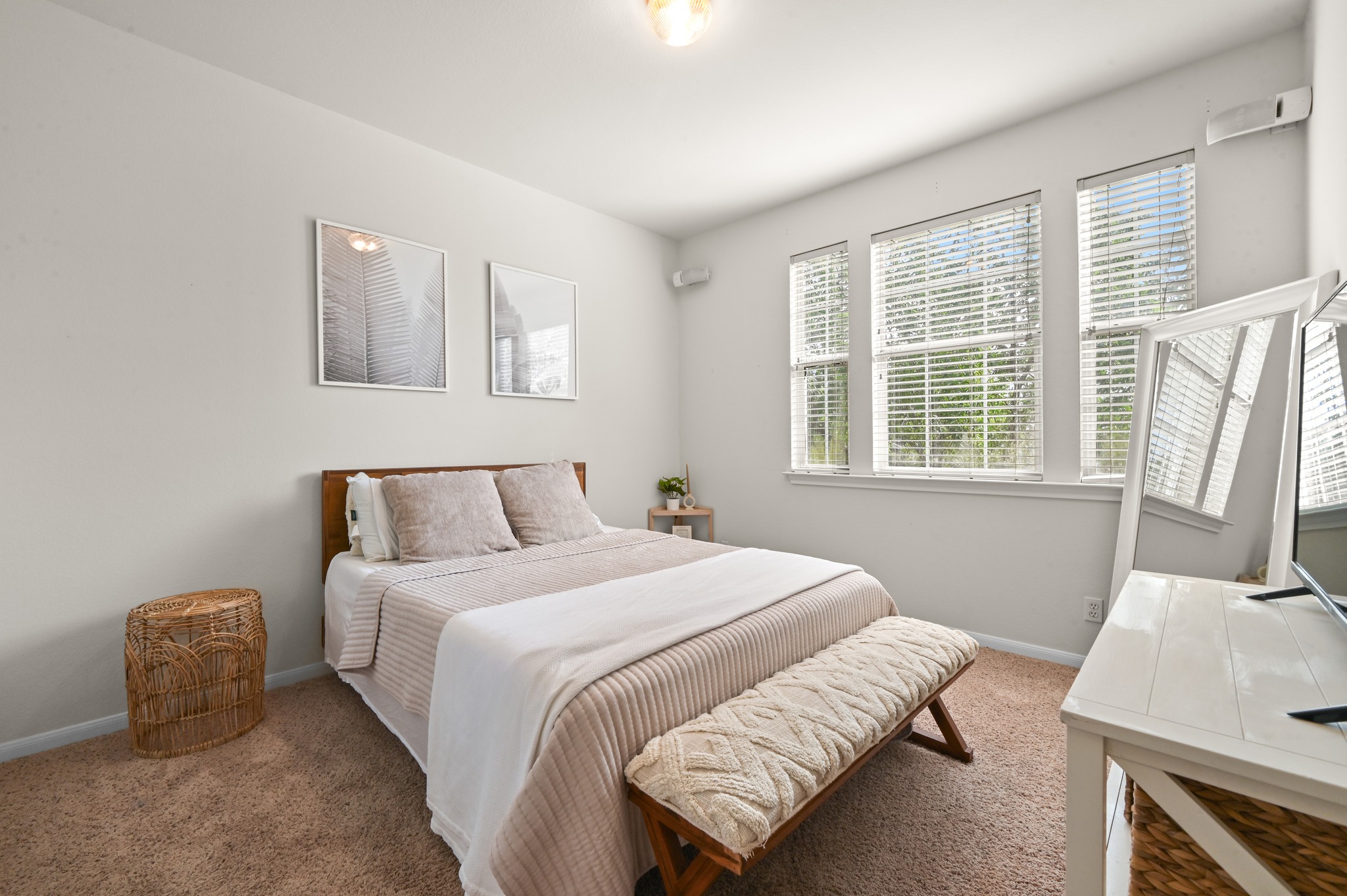 5888 Fergus Kyle, TX 78640 - Photo 24 of 40 A naturally illuminated bedroom offers comfort and a tranquil escape.