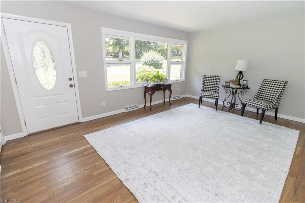 2216 Lane Road Greensboro, NC 27408 - Photo 8 of 38 LIVING ROOM: REFINISHED HARDWOOD FLOORS, ALL FRESHLY PAINTED.