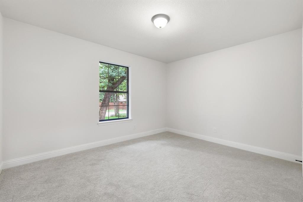 19 Timbergreen Circle Denton, TX 76205 - Photo 25 of 40 an empty room with a window