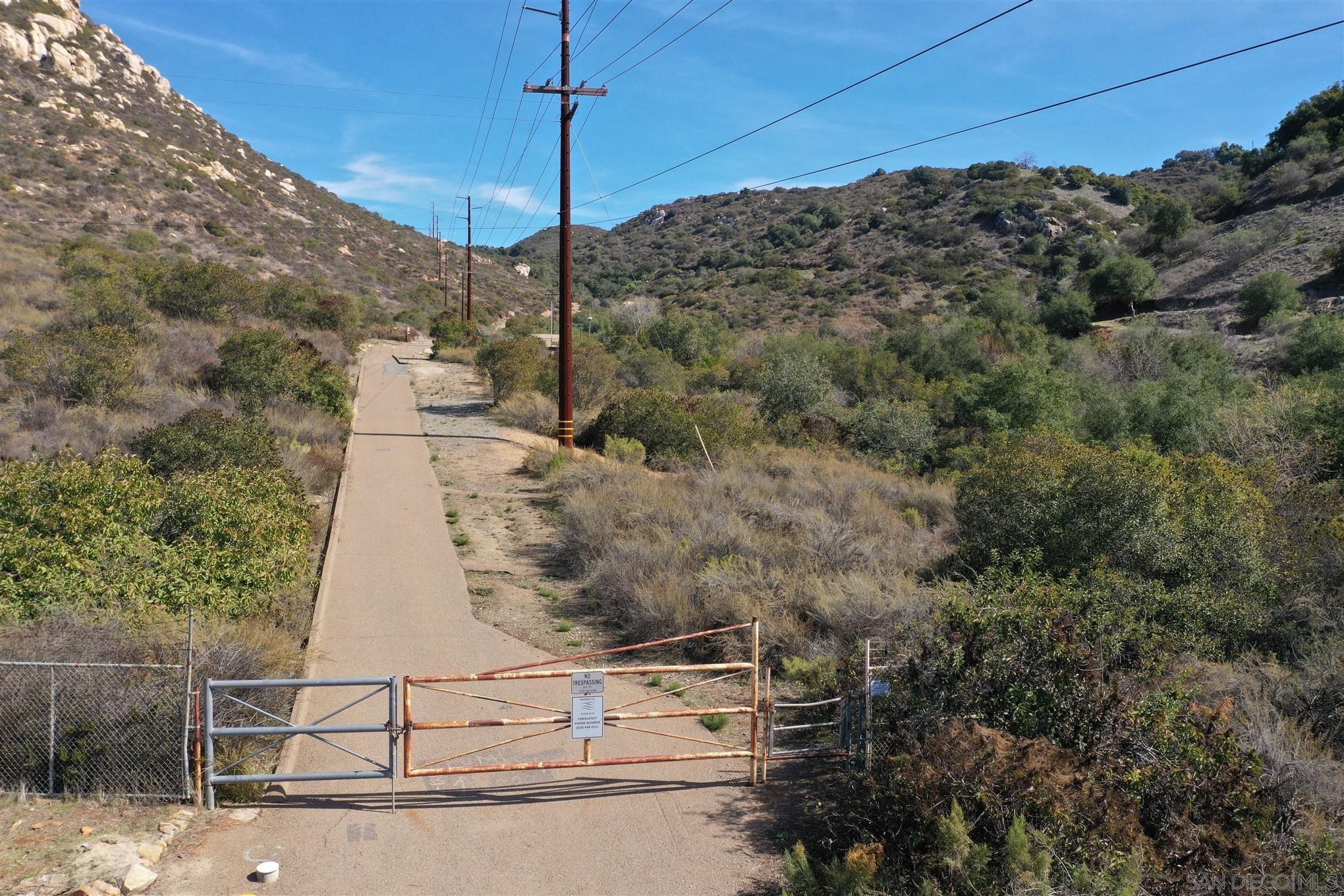 0 Rios Canyon Road, Unit 16 El Cajon, CA 92021 - Photo 12 of 12 a aerial view of a house with a forest
