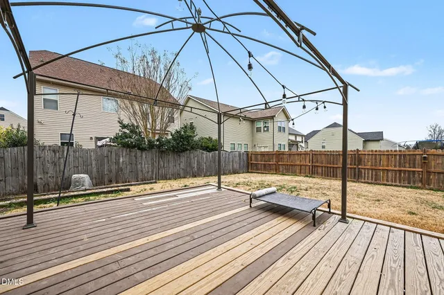 a bathroom with a toilet a sink and a mirror