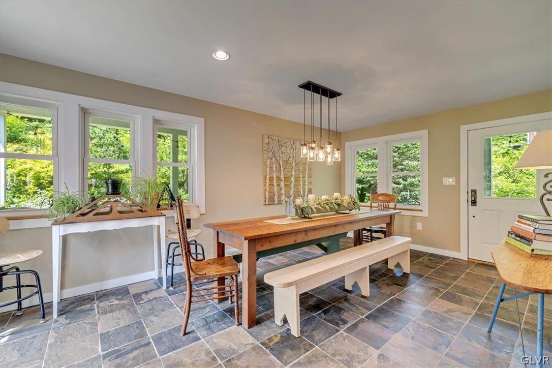 159 Monomonock Road Cresco, PA 18326 - Photo 15 of 50 a view of a dining room with furniture window and outside view