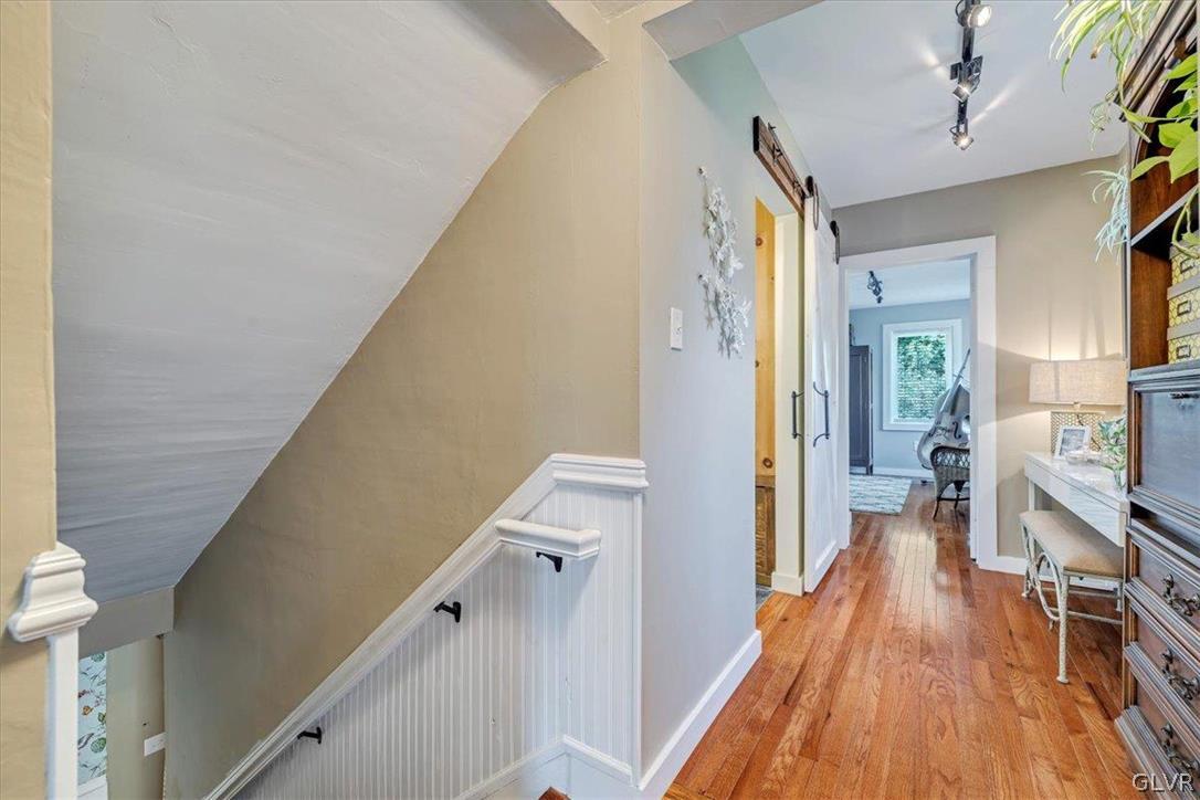 159 Monomonock Road Cresco, PA 18326 - Photo 17 of 50 a view of a hallway with wooden floor and staircase