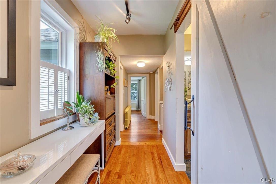 159 Monomonock Road Cresco, PA 18326 - Photo 18 of 50 a view of a hallway with wooden floor and staircase