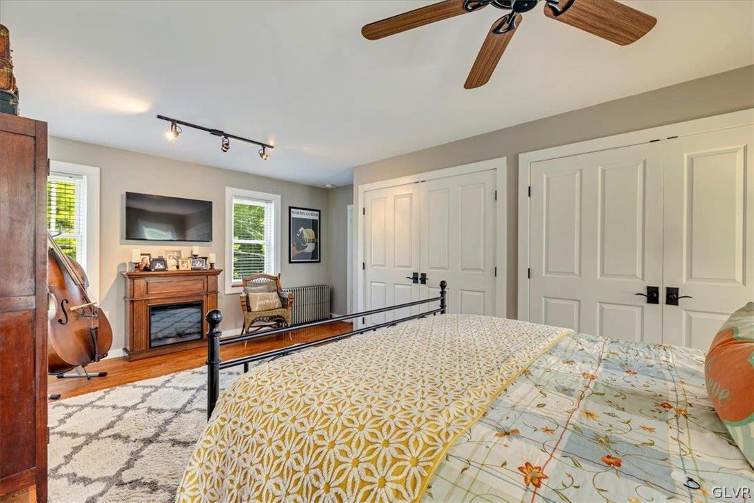 159 Monomonock Road Cresco, PA 18326 - Photo 20 of 50 a bedroom with a bed a desk and chair