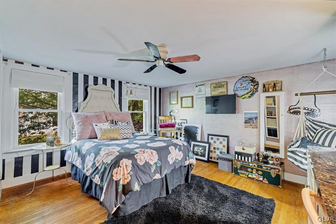 159 Monomonock Road Cresco, PA 18326 - Photo 26 of 50 a bedroom with a bed furniture and a large window