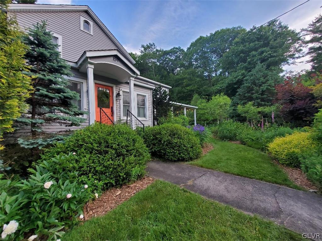 159 Monomonock Road Cresco, PA 18326 - Photo 30 of 50 a front view of a house with a yard