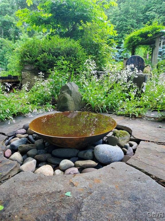 159 Monomonock Road Cresco, PA 18326 - Photo 32 of 50 a view of a backyard with plants