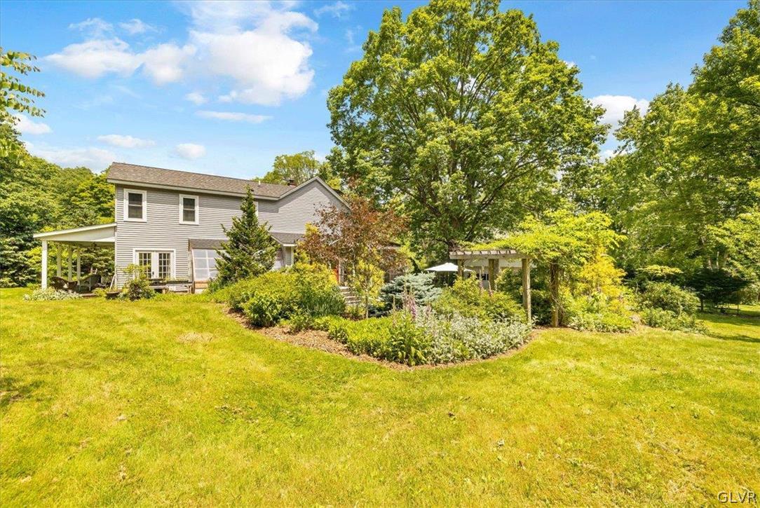159 Monomonock Road Cresco, PA 18326 - Photo 43 of 50 a view of a swimming pool with an outdoor space and seating area