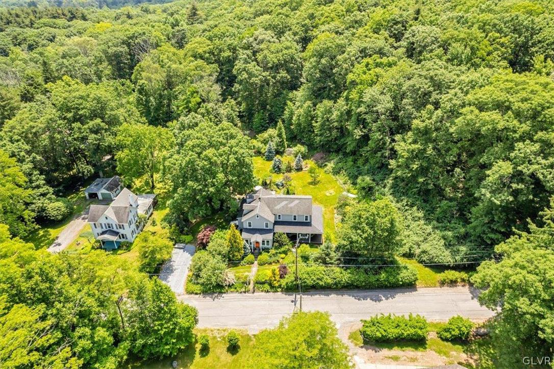 159 Monomonock Road Cresco, PA 18326 - Photo 49 of 50 an aerial view of a house with a yard basket ball court and outdoor seating