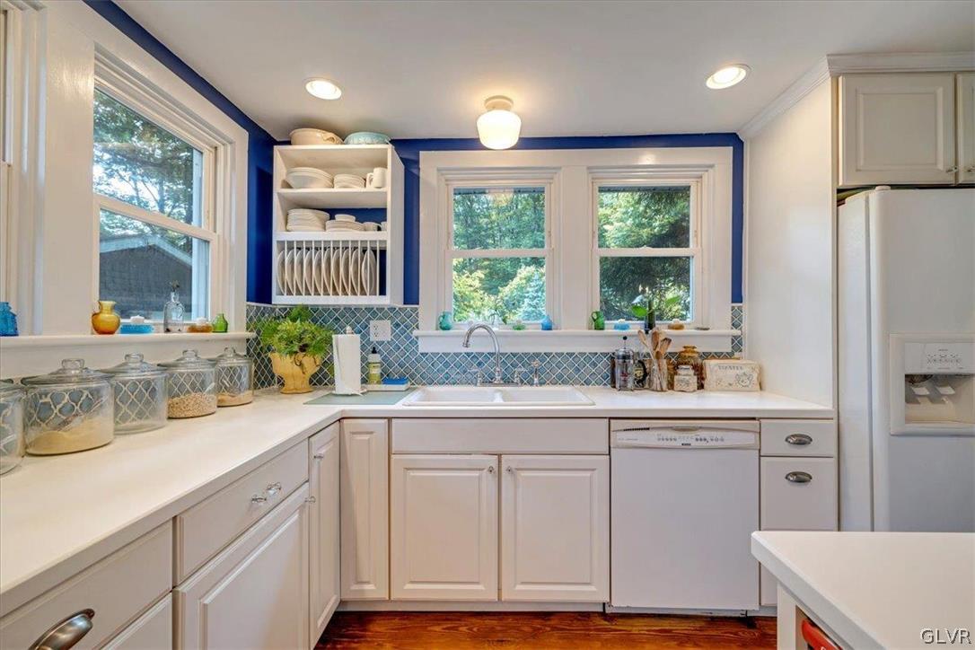 159 Monomonock Road Cresco, PA 18326 - Photo 8 of 50 a kitchen with a sink window and cabinets