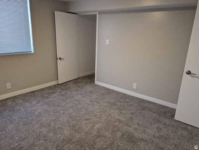 2880 Merton Way Magna, UT 84044 - Photo 20 of 30 Neutral-toned carpeting paired with light grey wall color