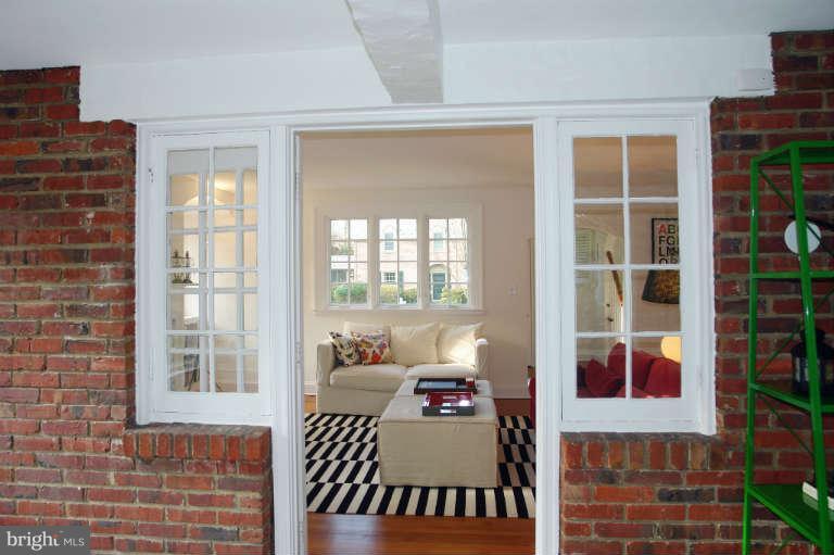 1107 Harriton Road Baltimore, MD 21210 - Photo 11 of 30 a bedroom with a bed and a window