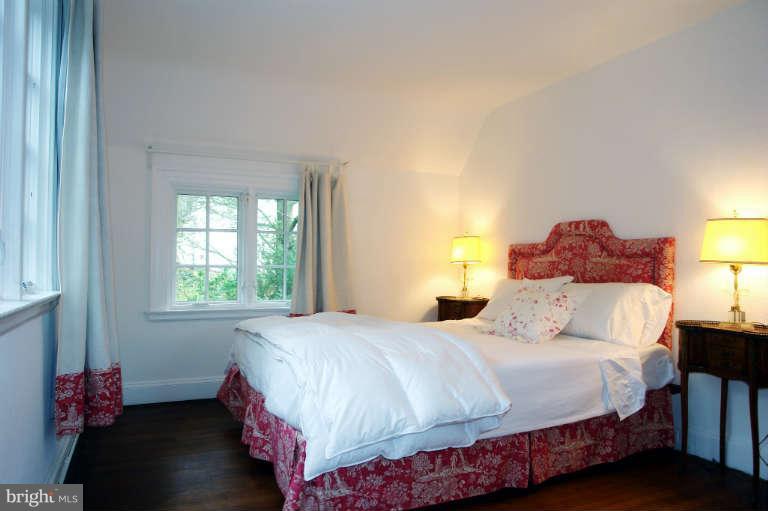 1107 Harriton Road Baltimore, MD 21210 - Photo 18 of 30 a bedroom with a bed and window