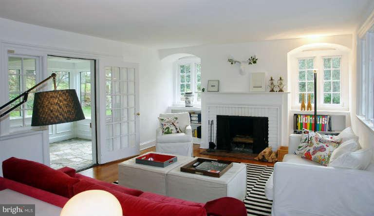 1107 Harriton Road Baltimore, MD 21210 - Photo 3 of 30 a living room with furniture and a fireplace