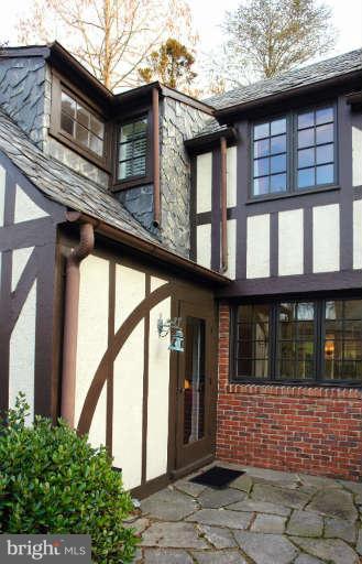 1107 Harriton Road Baltimore, MD 21210 - Photo 24 of 30 a front view of a house with large windows