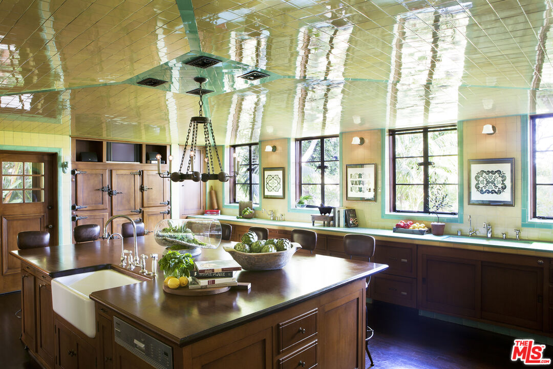 2400 Inverness Avenue Los Angeles, CA 90027 - Photo 11 of 18 a kitchen with a sink cabinets and window