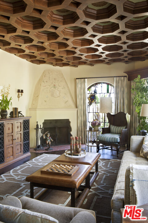 2400 Inverness Avenue Los Angeles, CA 90027 - Photo 8 of 18 a living room with furniture and a fireplace