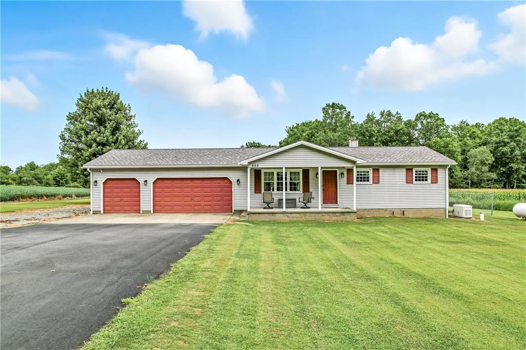a front view of a house with yard