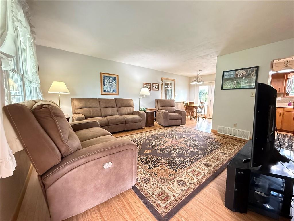 558 Clay Furnace Road Sharpsville, PA 16150 - Photo 19 of 49 a living room with furniture and a flat screen tv
